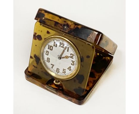 8 DAY TRAVEL CLOCK IN UNUSUAL CASE