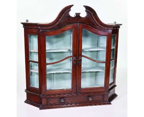 Late 19th-century Dutch oak wall hanging cabinet, swan neck pediment above two arched glazed doors covering painted two shelf