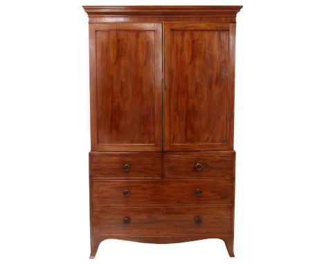 Early 19th-century mahogany linen press, top section with moulded cornice above two single panelled doors covering five slidi