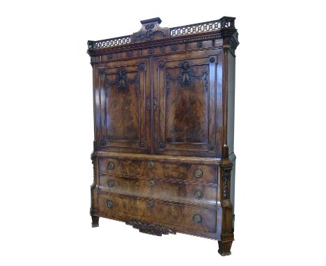 George III figured mahogany press cupboard, cornice with pierced fretwork decoration, repeating flower head mouldings, double