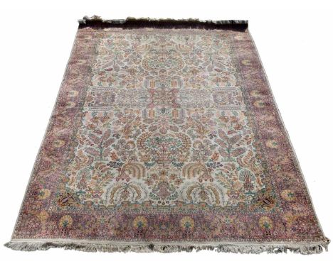 Modern silk and cotton Persian rug, ivory field with floral garden pattern.270cm (106") x 188cm (74")