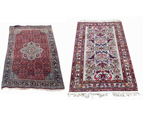 Tabriz pattern rug with madder field, ivory central medallion, also one Turkish patterned rug.163cm (64") x 110cm (43") and s