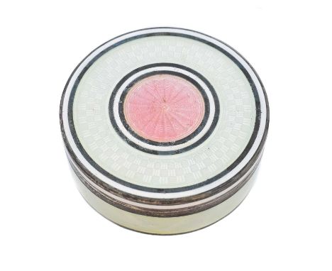 A silver enamel trinket box, of circular outline, the pink and opalescent guilloche enamel with white enamel borders, and sil