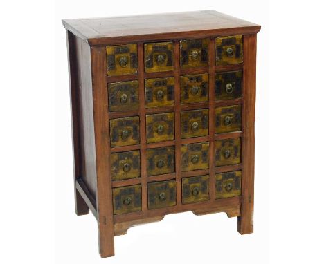 20th-century Chinese stained pine apothecary cabinet, containing twenty drawers with ring pull handles, each drawer front wit