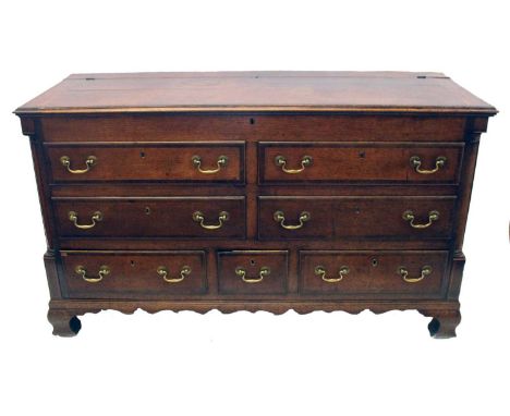 George III oak Lancashire chest, mahogany cross-banded lid ogee moulding above four false drawers and three true drawers, eac