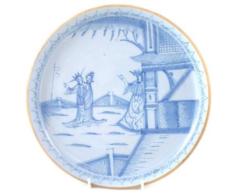 Delft saucer shaped dish circa 1760, probably Liverpool, painted with figures in blue. See Garner & Archer English Delftware 