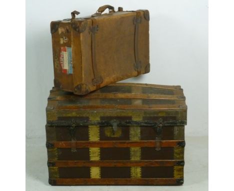 A leather suitcase with Canadian Pacific labels and a dome top trunk, 82 by 48 by 53cm high.