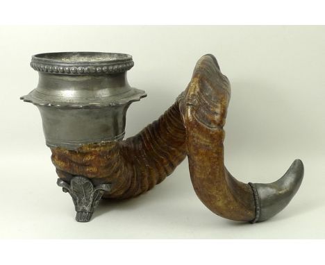 A Victorian ram's horn with pewter mounts, possibly a table snuff box, 26 by 20 by 16cm. 