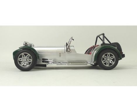 A Kyosho model of a Caterham Super Seven Clam Shell Fender, scale 1:18, together with a Caterham Super Seven Cycle Fender, sc