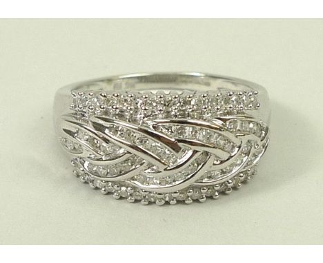 A 9ct white gold and diamond ring in a plaited design, size R, 5.1g.