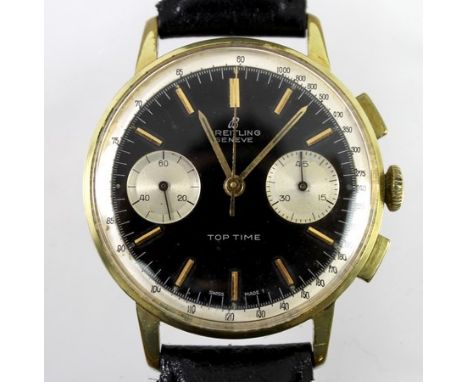 A Breitling gentleman's gold plated Top Time chronograph wristwatch, model 2003, late 1960's, silver and black panda dial wit