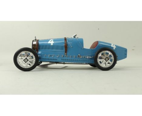 A CMC scale model of a Bugatti Typ 35 Grand Prix 1924, scale 1:18, mint and boxed.