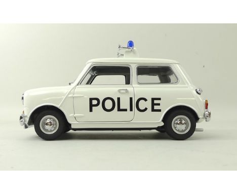 A Kyosho Mini 50th Anniversary model of a Morris Mini Cooper S 1964 Monte Carlo Winner No 37, scale 1:18, together with a Min