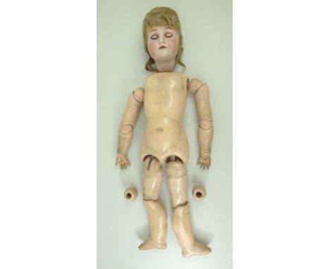 A Simon Halbig doll with bisque head and open mouth, '73' impressed to the neck and H and R around the star impressed to the 
