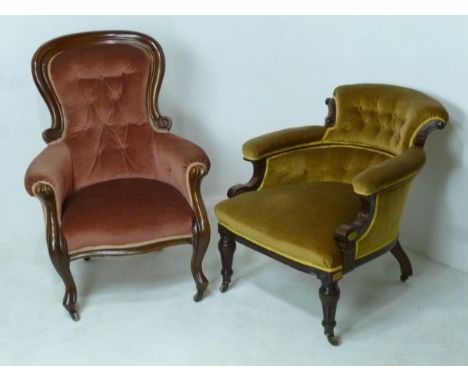 A Victorian balloon back arm chair, the mahogany carved frame upholstered in pink velvet, with button back and knop feet on c