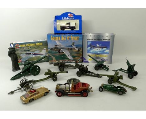 A group of toys, comprisingco various vintage Britains Field Guns and Cannons complete with firing pins and springs, a Golden