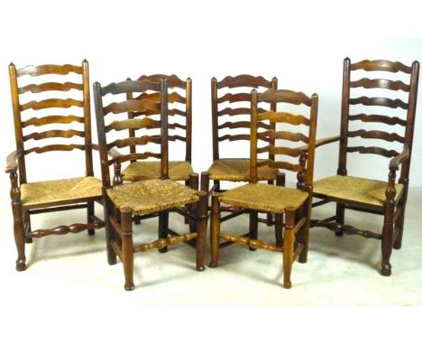 A set of six 18th century elm ladder back chairs, with sea grass seats, including two carvers, 65 by 43 by 109cm high.