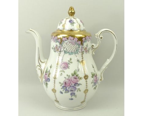 A Johann Seltman porcelain part coffee service of pear form decorated with festoons of roses, gilt heightened, pattern number