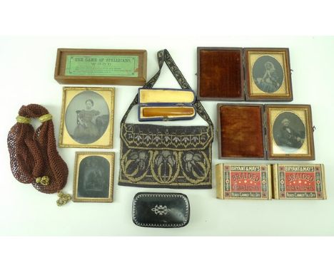 An Art Nouveau floral evening purse, amber cigarette holder, four daguerreotypes, miser's purse, lacquer snuff box, two boxes