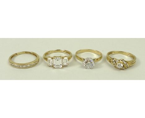 A 14ct gold and zircon solitaire ring, size Q, 14ct gold and zircon pave set ring, size R, 14ct gold and zircon three stone r