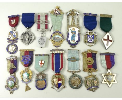 A collection of silver and silver and enamel Masonic jewels, comprising a Grand Lodge of Mark Master Masons Jubilee medal 185