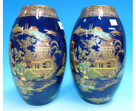 A 1930's pair of Carltonware vases in blue and gilt, with chinoiserie decoration, height 10"