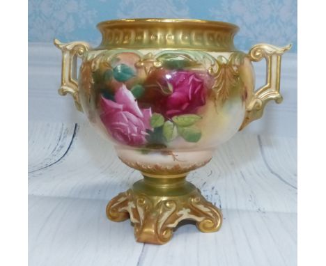 A late 19th Century Royal Worcester porcelain squat 2-handled vase on 4 raised scroll feet,  hand painted with floral decorat