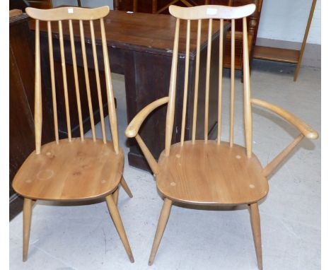 Two Ercol dining chairs, one a carver