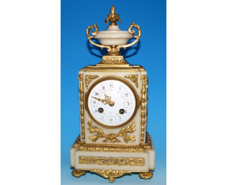 A 19th century Louis XVI style white marble and ormolu mantel clock with classical vase finial, garlanded white enamel dial l