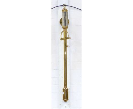 A reproduction ships barometer with mercury column, in brass case, with gimbal bracket