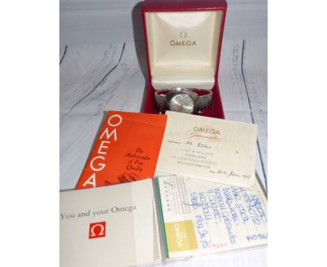 An Omega 'Electronic F300HZ Chronometer, Genève' in stainless steel case with matching strap, having matt steel dial, baton n