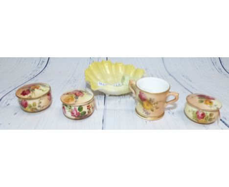 Three late 19th Century Royal Worcester porcelain miniature covered trinket pots hand painted with floral decoration against 