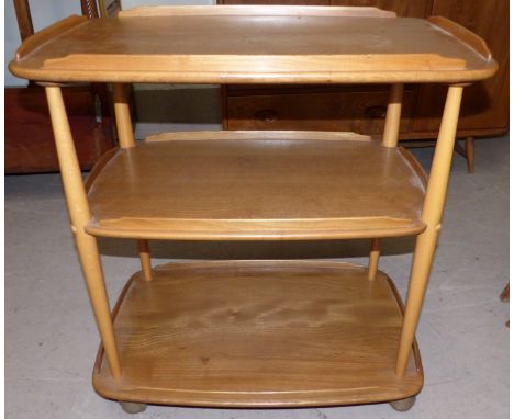 An Ercol light elm 3 tier tea trolley