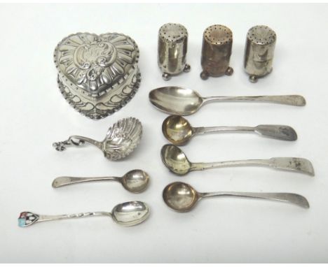 Silver, comprising; a Victorian heart shaped hinge lidded trinket box, with embossed decoration, Birmingham 1894, three peppe