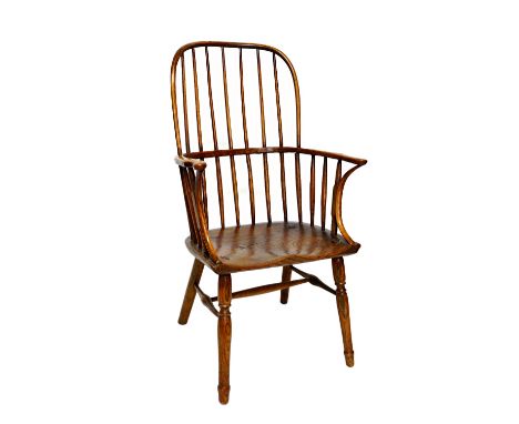 A George III ash and elm stick back Windsor chair, with unusual arm support above solid saddle seat on turned supports.Illust