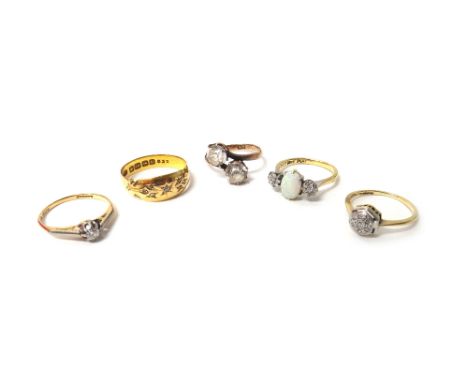 A gold and diamond set seven stone hexagonal cluster ring, an 18ct gold and diamond set ring, Birmingham 1913, a gold and pla