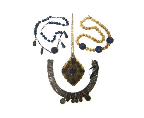 Mostly Eastern jewellery, including; six Indian Pertubghar green glass and gilt panels, a collar necklace having pendant moun
