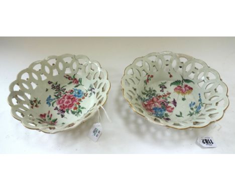 A pair of Worcester circular pierced baskets, circa 1765, each painted in the studio of James Giles with flower sprays, (a.f)