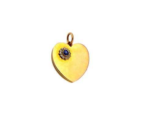 A gold, sapphire and diamond set oval pendant locket, the front mounted with a cluster centred by an oval cut sapphire within