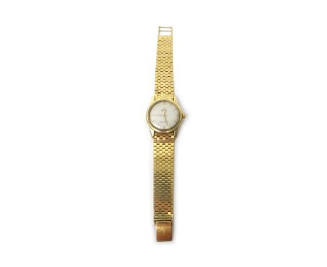 A gentleman's gold Omega Seamaster Automatic bracelet wristwatch, the signed circular silvered dial with gilt Arabic and arro