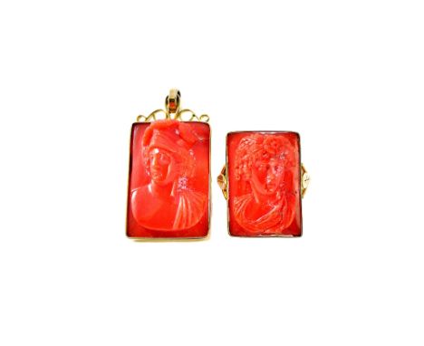 A gold mounted coral cameo ring, the rectangular coral cameo carved as the portrait of a classical lady, between foliate spli