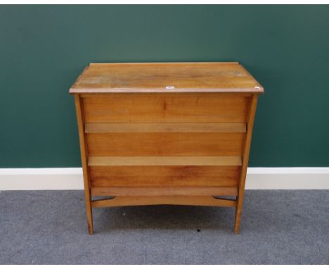 Heals; a 20th century birch three drawer chest on splayed supports, with ivory discs reading 'Heals, Tottenham Court Road, Lo