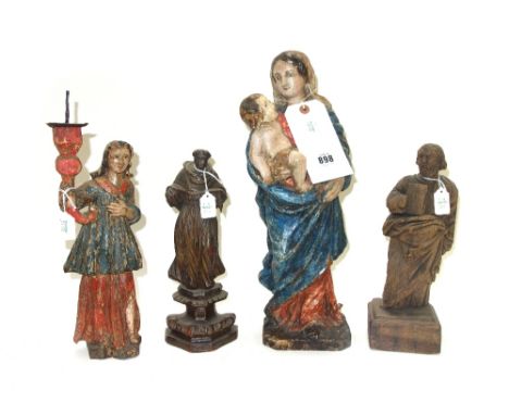 An 18th century carved wooden figure depicting a biblical subject 29cm high; another Continental carved wooden Monk, probably