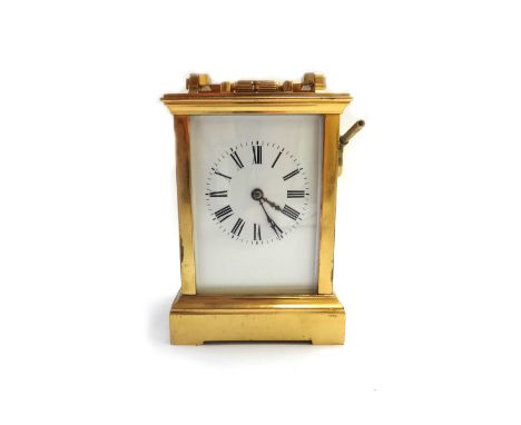 A gilt brass cased carriage clock, 19th century, hour repeat chiming on a gong, with a two train movement, white enamel dial 