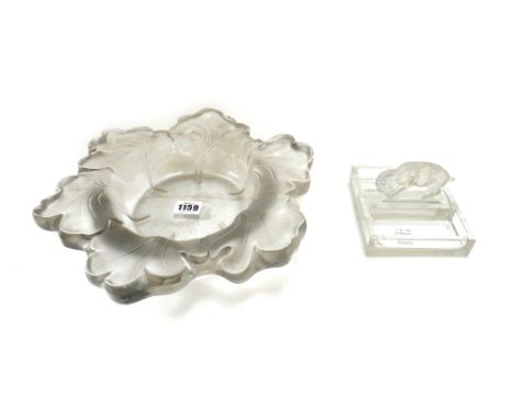 A Lalique clear and frosted glass bowl with wide floral moulded border, etched mark 'Lalique France', 31cm wide, and a Laliqu