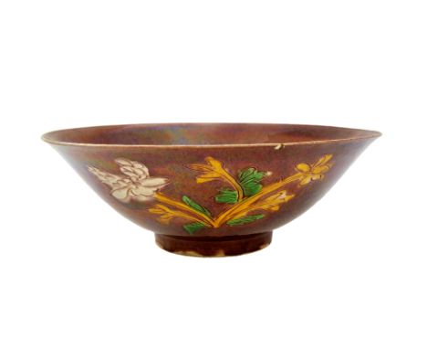 A Chinese porcelain Brinjal bowl, Kangxi, incised in peony and glazed in green, yellow and white with flower sprays against a