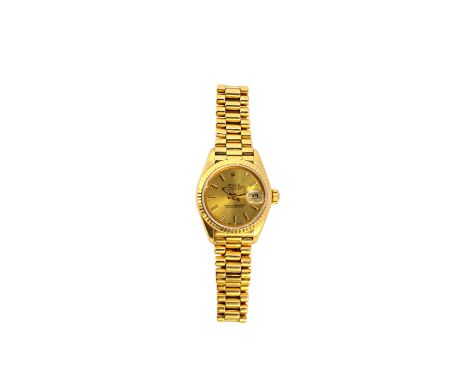 A lady's 18ct gold Rolex Oyster Perpetual Datejust bracelet wristwatch, the signed circular gilt dial, with baton shaped nume