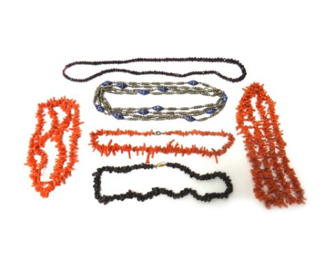 Three single row necklaces of branch corals, a single row necklace of faceted garnet beads, graduating in size to the front, 