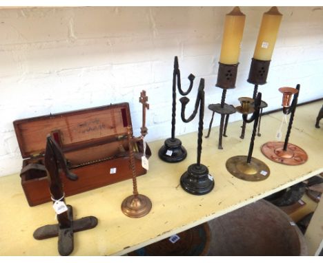An Arts and Crafts style copper and wrought iron rush light candlestick, stamped 'Youghal' to the base, 25cm high, two brass 