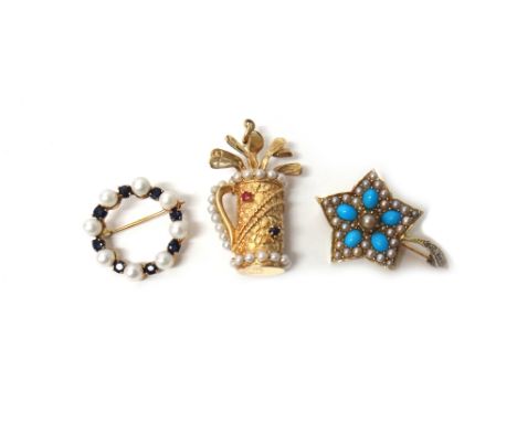 A gold, cultured pearl, ruby and sapphire set pendant, designed as a bag of golf clubs, detailed 14 K, gross weight 11 gms, a